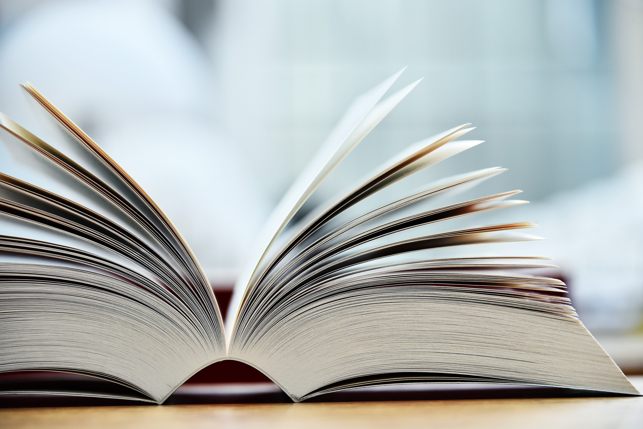 Books lying on the table in the public library